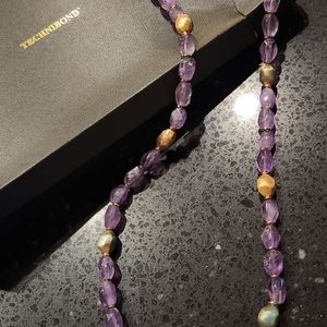 Amethyst w gold tone accent necklace